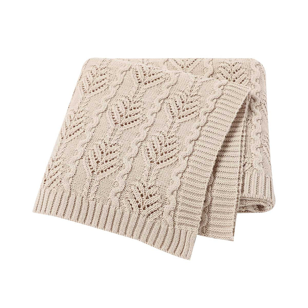 Beige coloured Fern Gully knitted baby blanket for reborn dolls and newborn babies.
