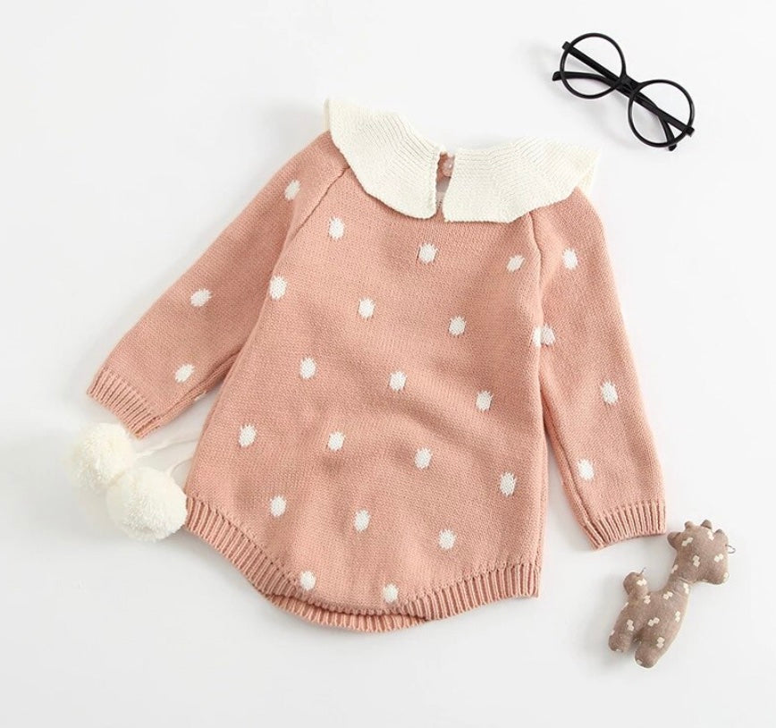 Back of pink Knit bubble rompers with white peter pan collars, a drawstring around the waist with two pompoms, and buttons at the crotch and back of neck. Reborn Doll Clothes and Baby Clothing.