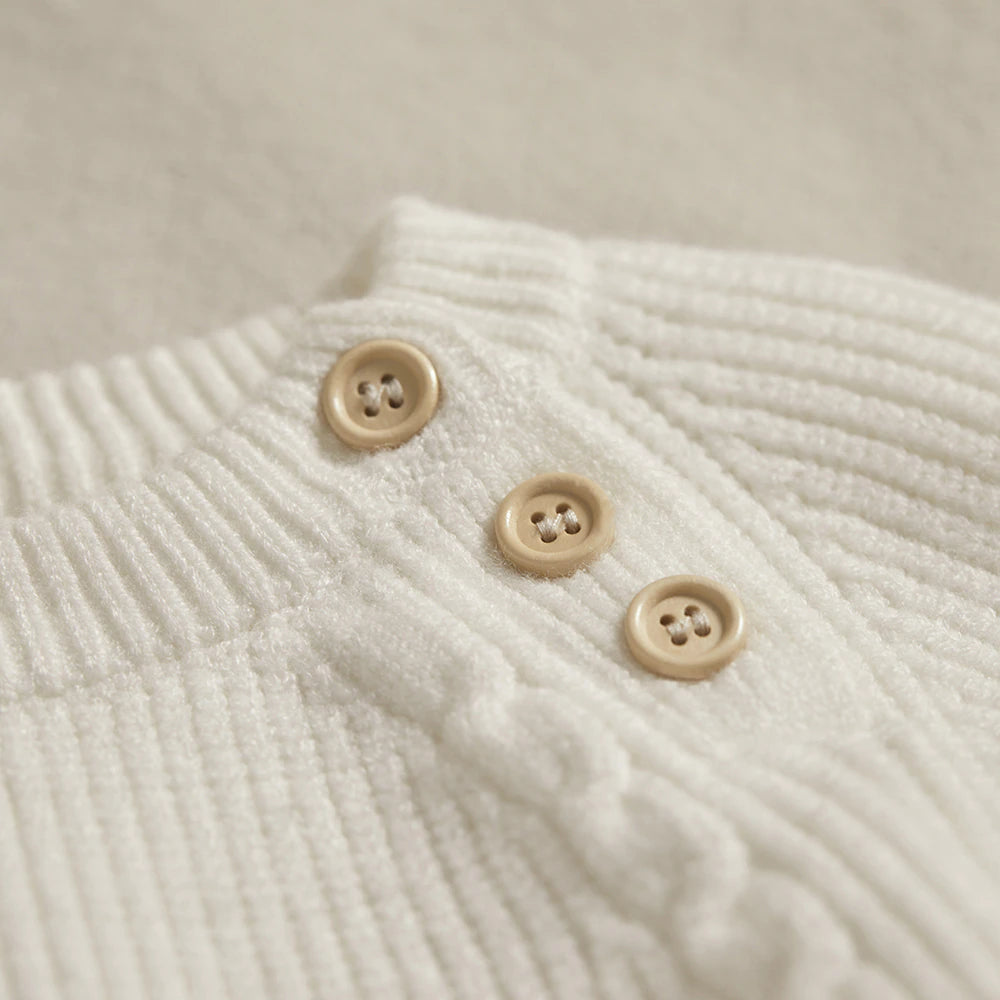 Spanish knitted boho long-sleeve onesies for babies and reborn dolls.