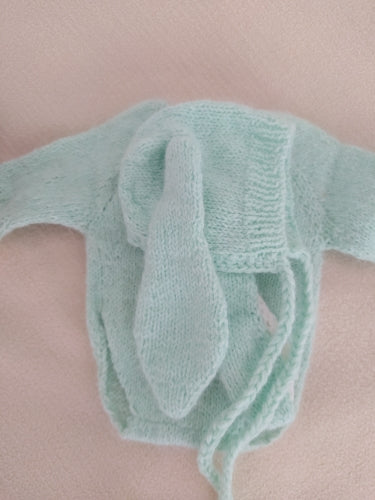 Mint green angora goat mohair knitted fuzzy floppy eared bunny rabbit bonnet with drawstring and long sleeve onesie romper for newborn photography, preemies, and reborn baby dolls.