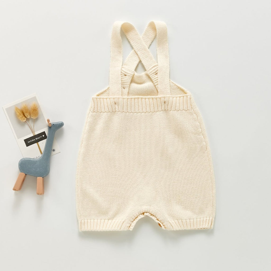 Back of Off-White cream color knitted overall romper with adjustable straps for baby boys, baby girls, reborn dolls, reborns and cuddle babies.