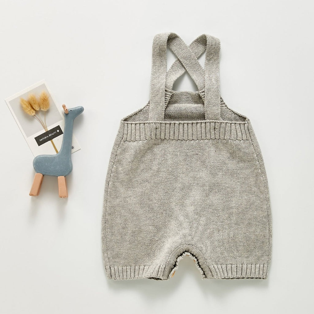 Back of Light grey color knitted overall romper with adjustable straps for baby boys, baby girls, reborn dolls, reborns and cuddle babies.