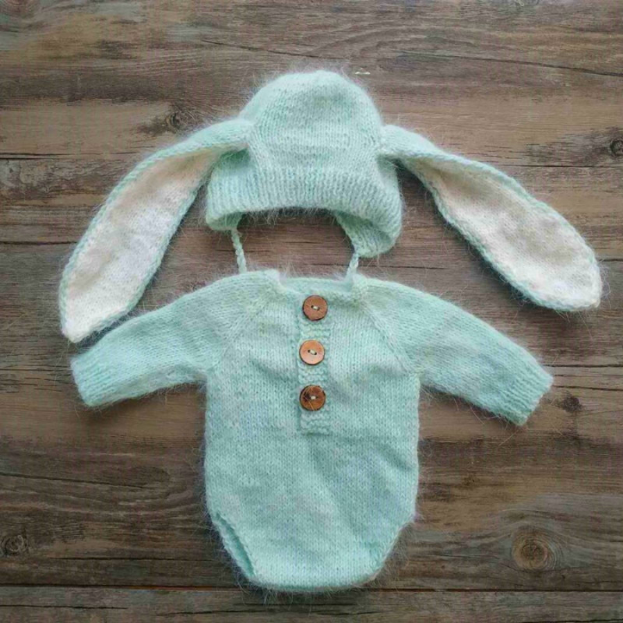 Mint green knitted bunny rabbit newborn photography hat and long-sleeve onesie bodysuit for reborn baby dolls.