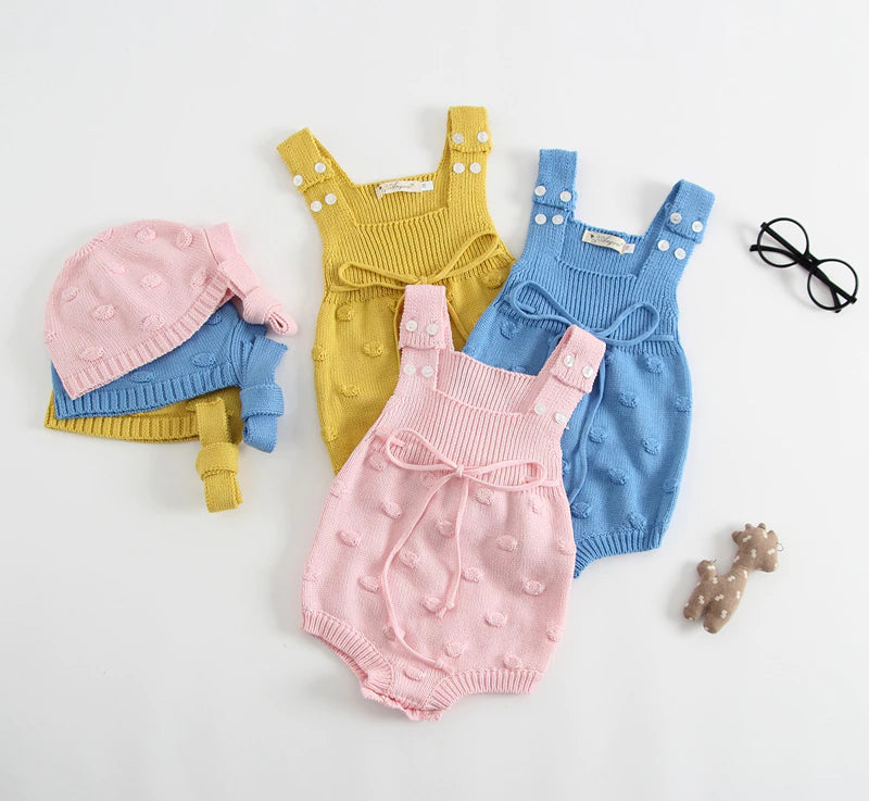 Pink, mustard yellow and powder blue knitted overall onesies with dots and matching vintage bonnets with drawstrings for baby girls and reborn dolls.