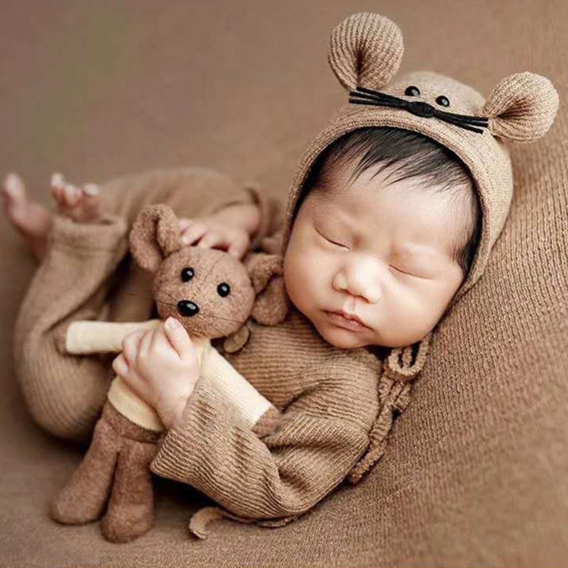 Newborn baby boy wearing a brown preemie and newborn sized three piece photography outfit with mouse bonnet and mouse stuffie for reborn baby dolls.