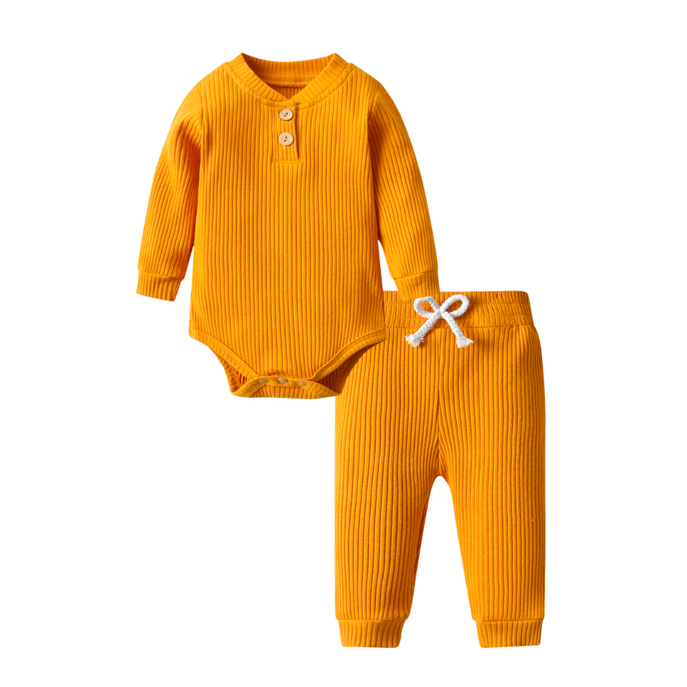 Mustard yellow ribbed onesie and pant set called The Baby Oliver ribbed jogging suit for reborn baby boys and newborn babies.