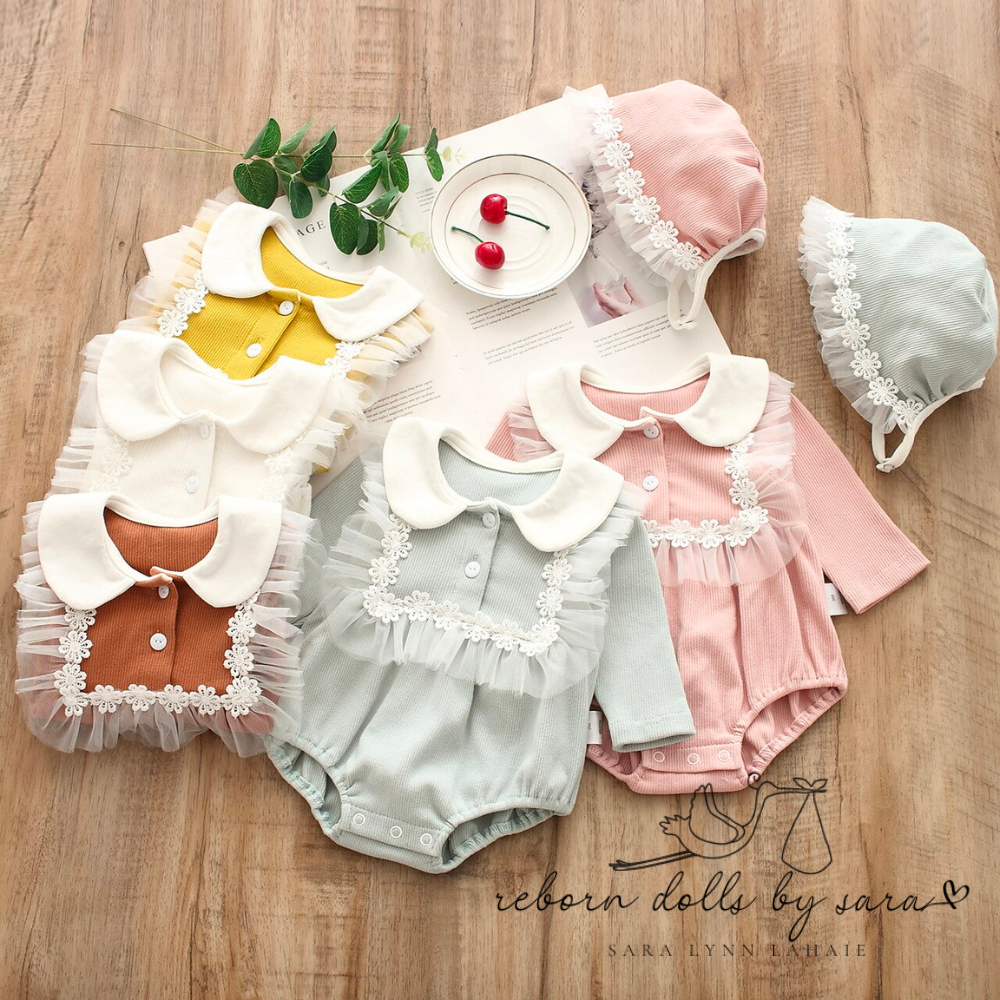 Peter Pan Bubble Romper Spanish Baby Clothing for reborn baby dolls and newborn baby girls with matching vintage bonnets.