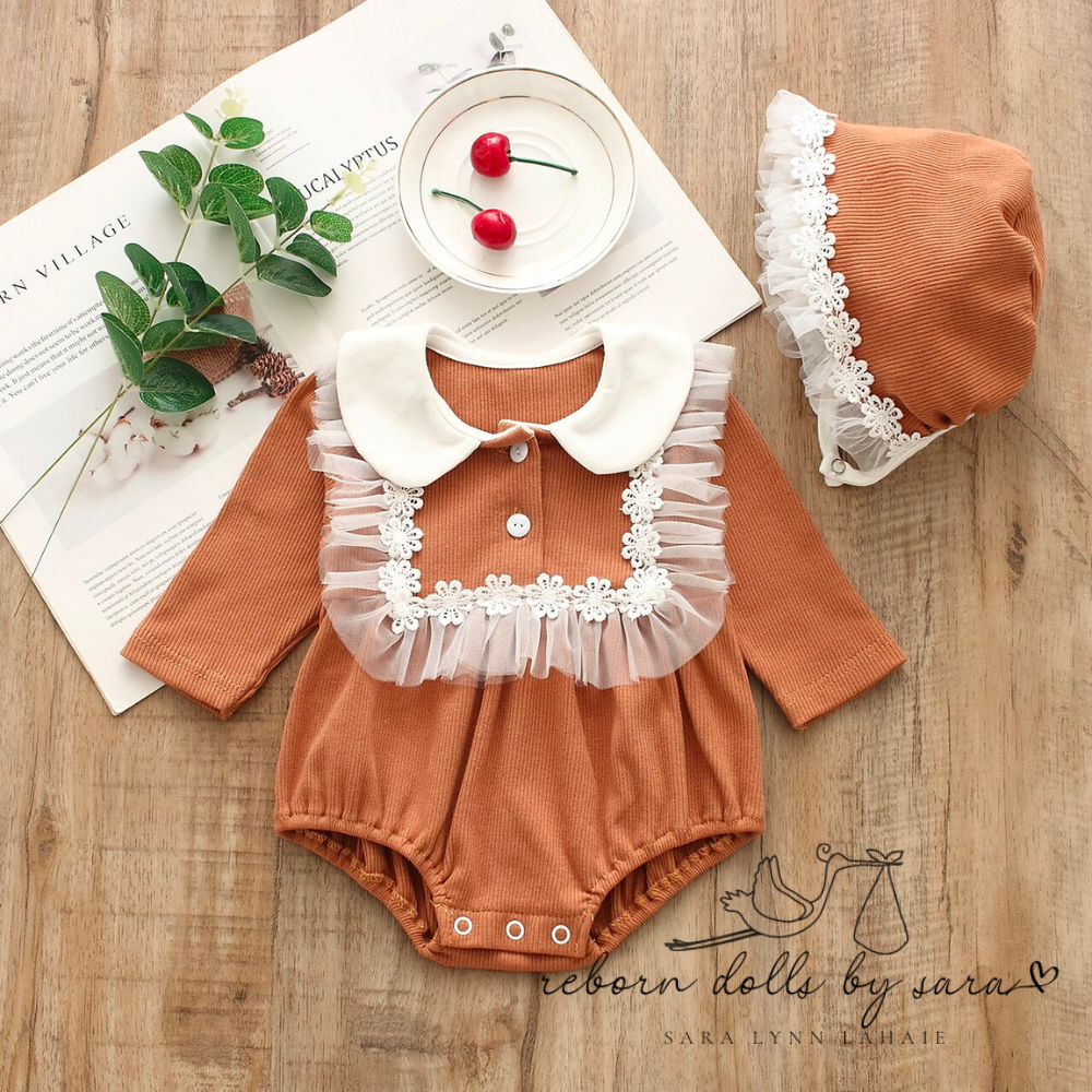 Brown long sleeve peter pan collar cotton bubble romper with floral lace bib and matching bonnet with lace for baby girls reborns reborn dolls cuddle babies.