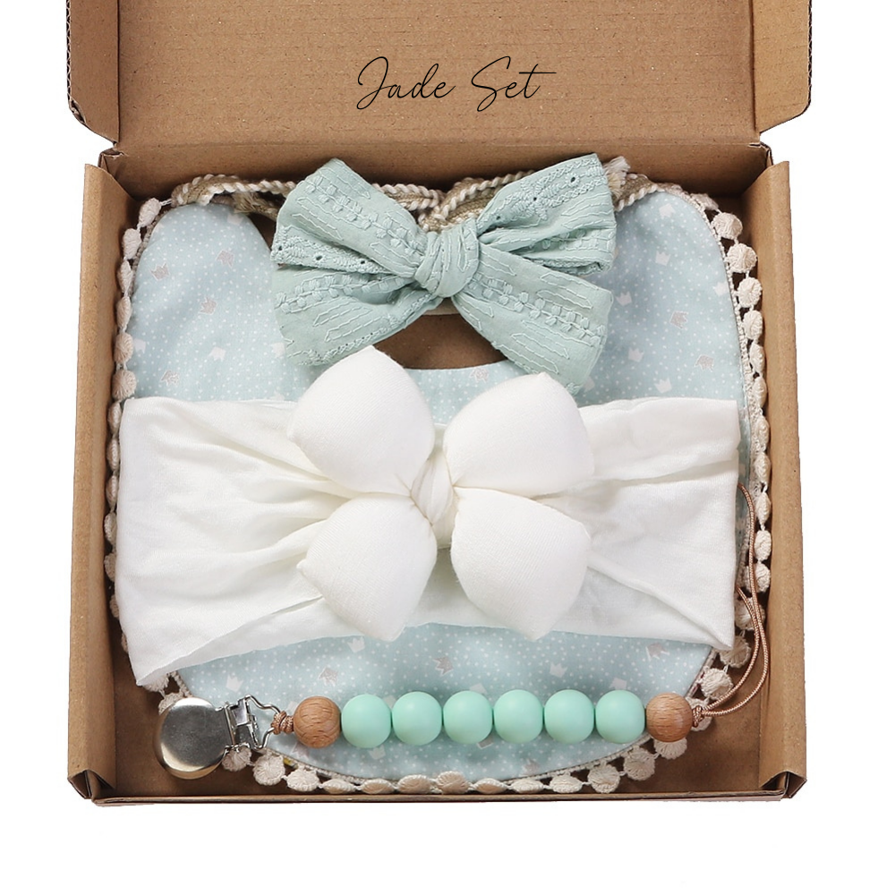 4 Piece Reborn Baby Girl Doll Accessories Sets Box Openings Gifts with boho bibs, two headbands and a silicone pacifier clip.