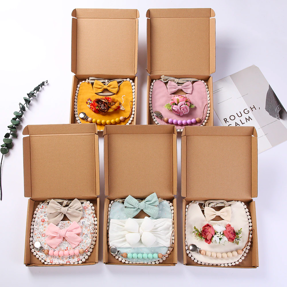 4 Piece Reborn Baby Girl Doll Accessories Sets Box Openings Gifts with boho bibs, two headbands and a silicone pacifier clip.