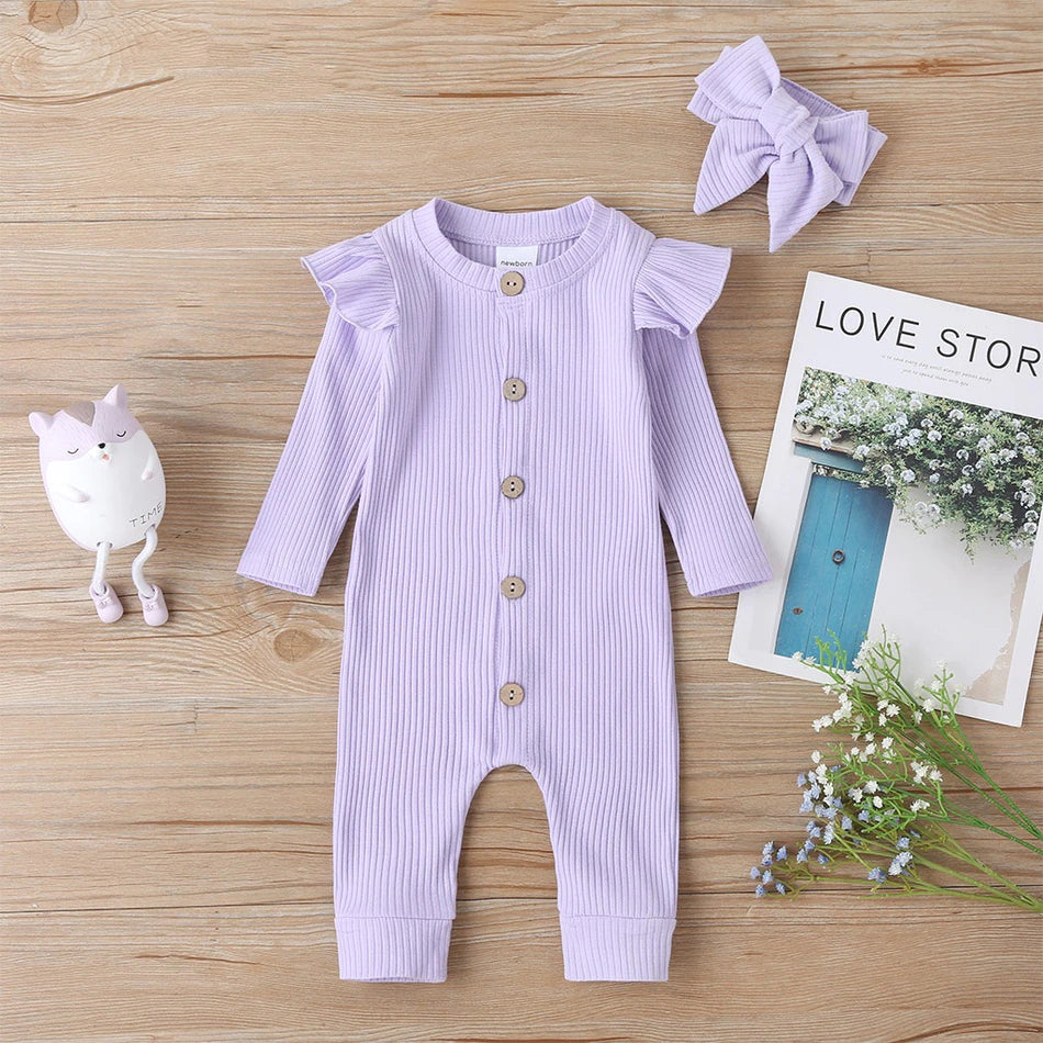 Lilac purple boho ribbed long-sleeve jumpsuit romper with buttons, frilly shoulder sleeves and a matching headband for reborn doll clothing and baby girls.