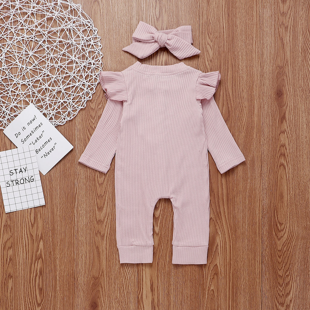 Back of the pink boho ribbed long-sleeve jumpsuit romper with buttons, frilly shoulder sleeves and a matching headband for reborn doll clothing and baby girls.