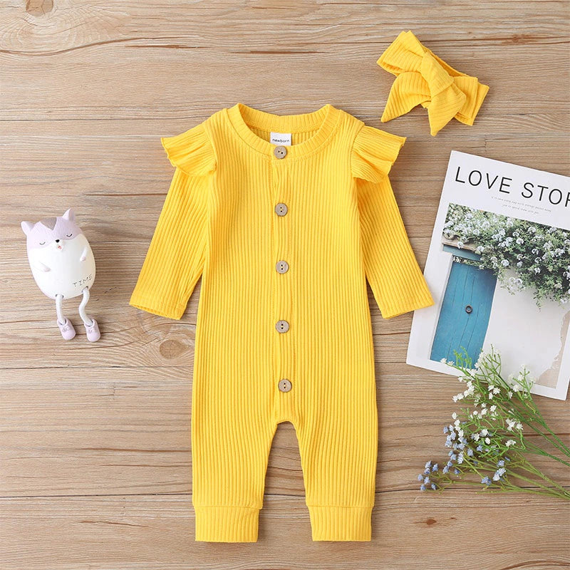 Yellow boho ribbed long-sleeve jumpsuit romper with buttons, frilly shoulder sleeves and a matching headband for reborn doll clothing and baby girls.