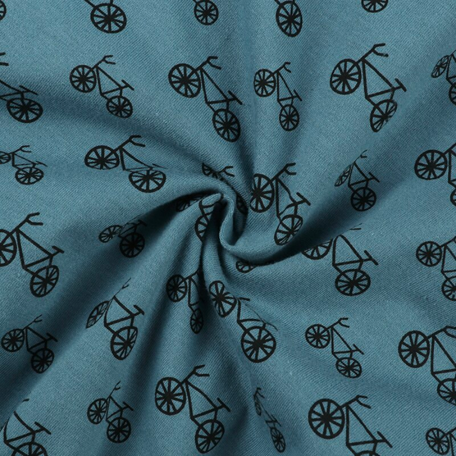 Teal blue Pushkin boho sleep gown sleep sack with black bicycles for reborn dolls and newborn babies boys and girls with elastic bottom and snap button closures.