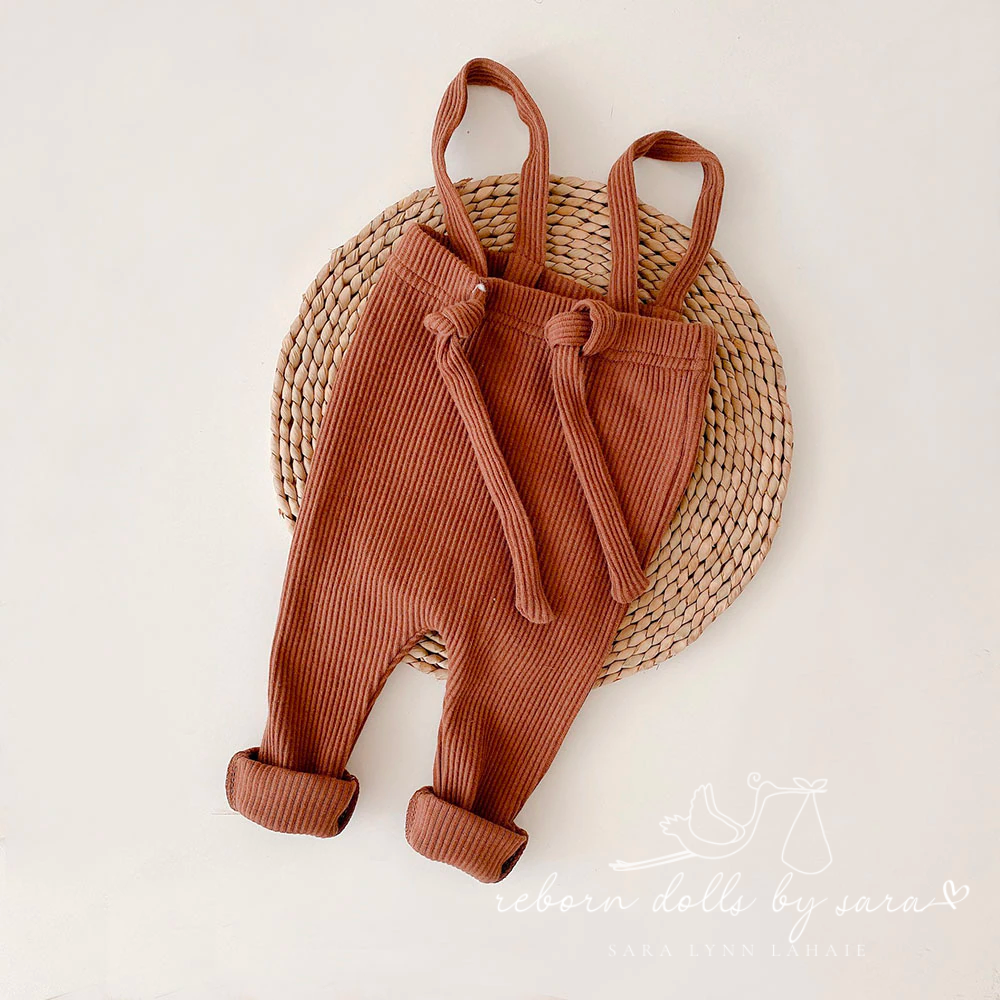 Brick brown colored bohemian ribbed adjustable baby overalls for reborn dolls.