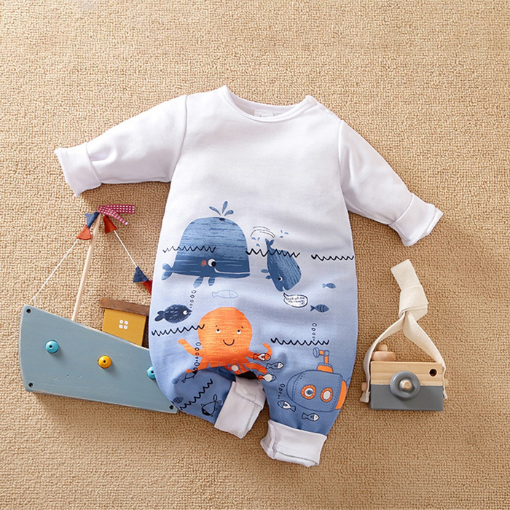White long-sleeve romper with blue whales, water, orange octopi, and a submarine on it for reborn baby boys.