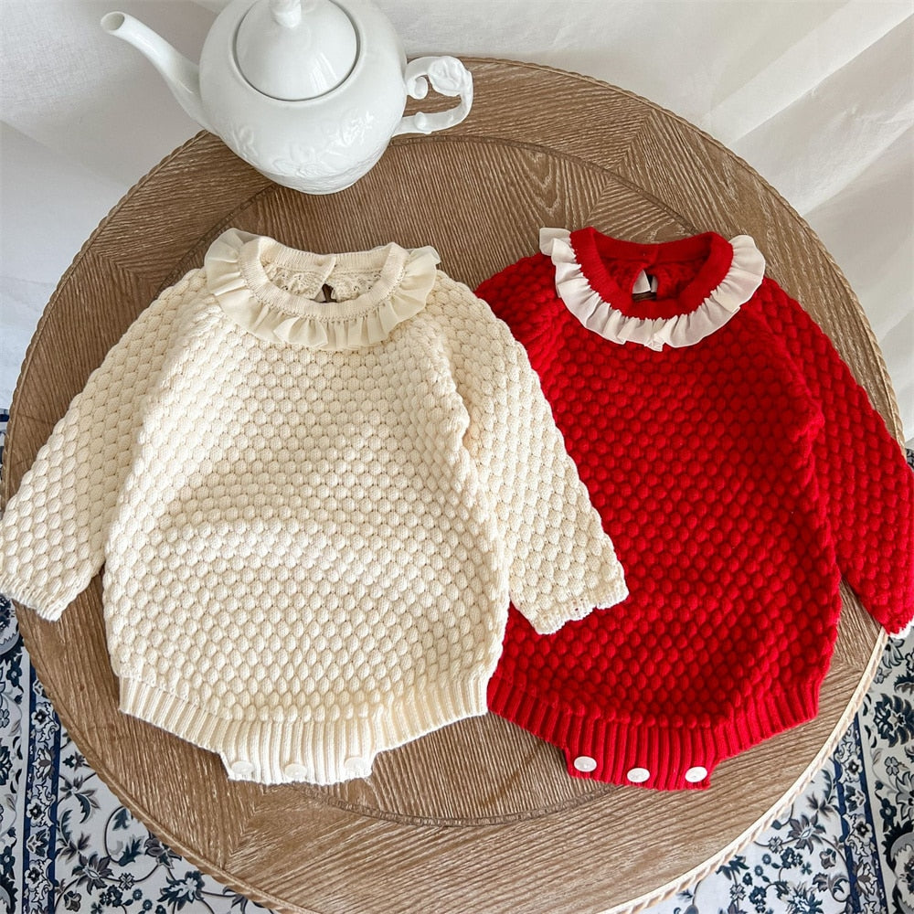 Red and off-white cream white long-sleeve knitted bubble romper onesies for baby girls with lace collars for reborn dolls.