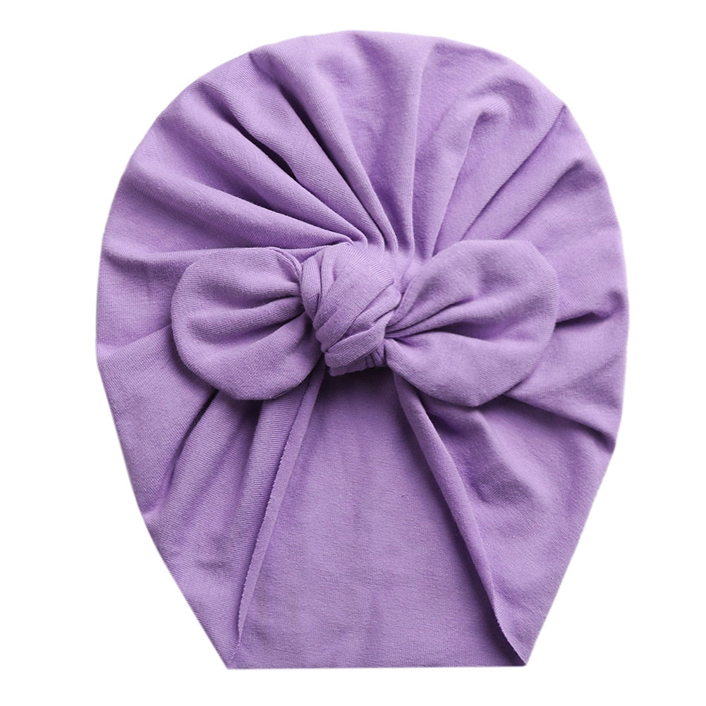 Light purple boho butterfly turban head wrap for newborn babies and reborn dolls.