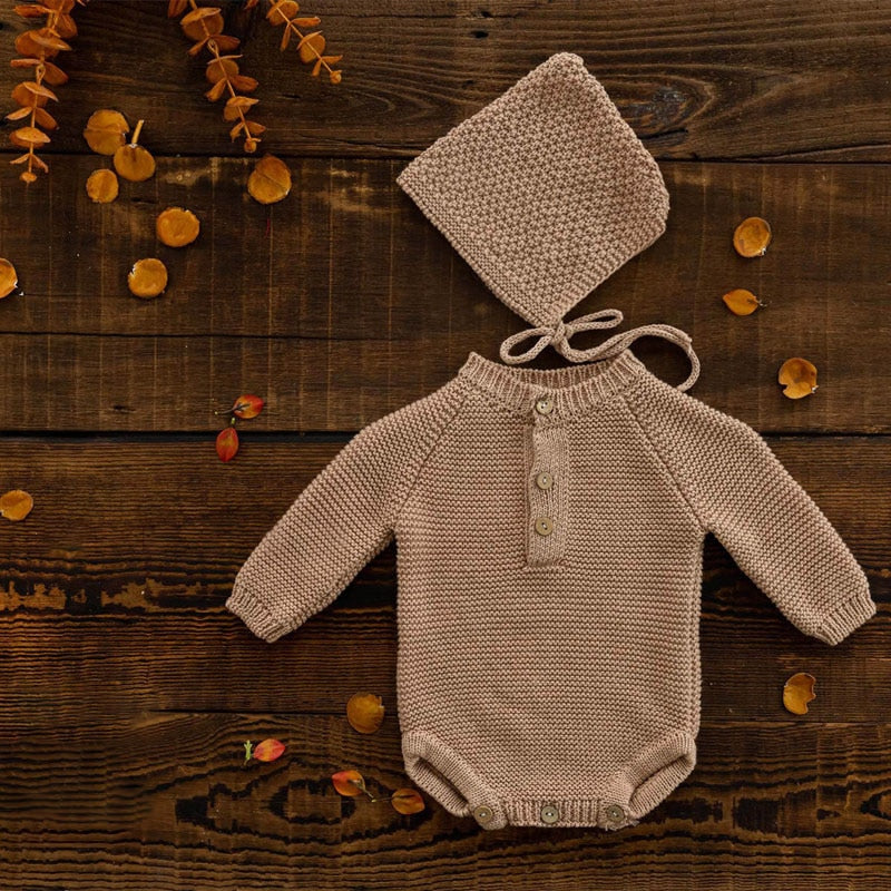 Light tan brown long-sleeve crochet knitted baby onesie with matching pixie bonnet for reborn baby dolls and newborn photographers.