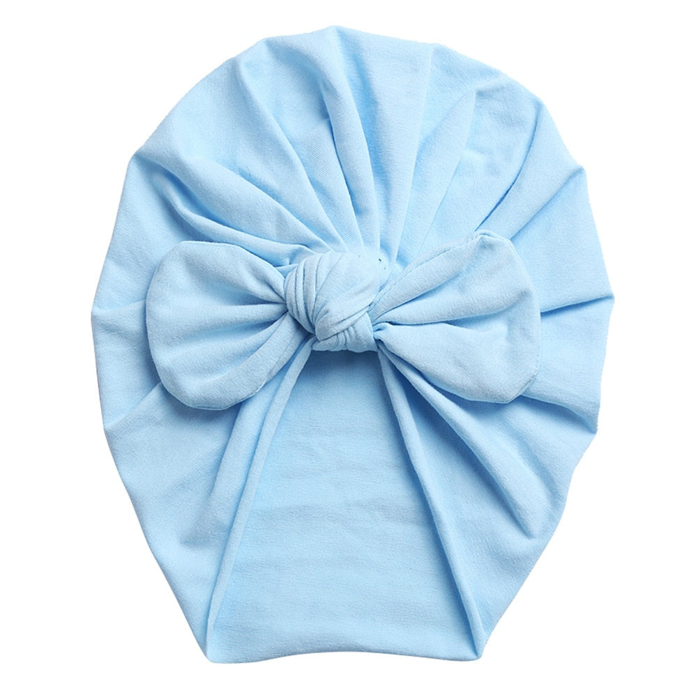 Baby blue boho butterfly turban head wrap for newborn babies and reborn dolls.