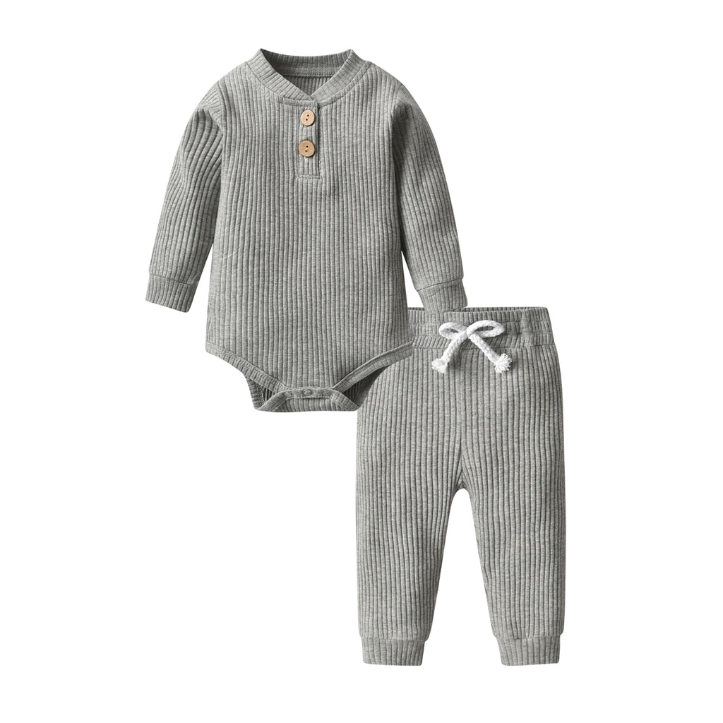 Light grey ribbed onesie and pant set called The Baby Oliver ribbed jogging suit for reborn baby boys and newborn babies.
