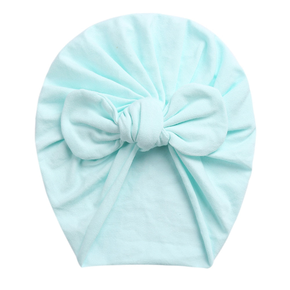 Aqua boho butterfly turban head wrap for newborn babies and reborn dolls.