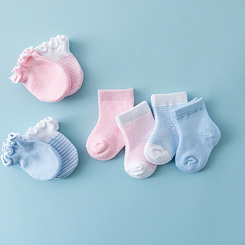 Preemie and newborn sized reborn doll socks and anti-scratch mittens in pink and blue solid and striped colors.