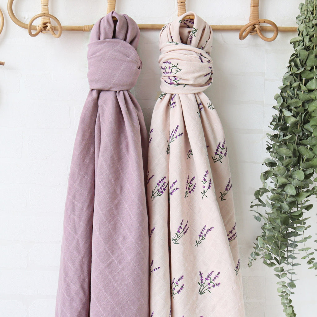 One purple and one cream colored lavender floral pattern boho muslin swaddle blanket wraps for reborn baby dolls.