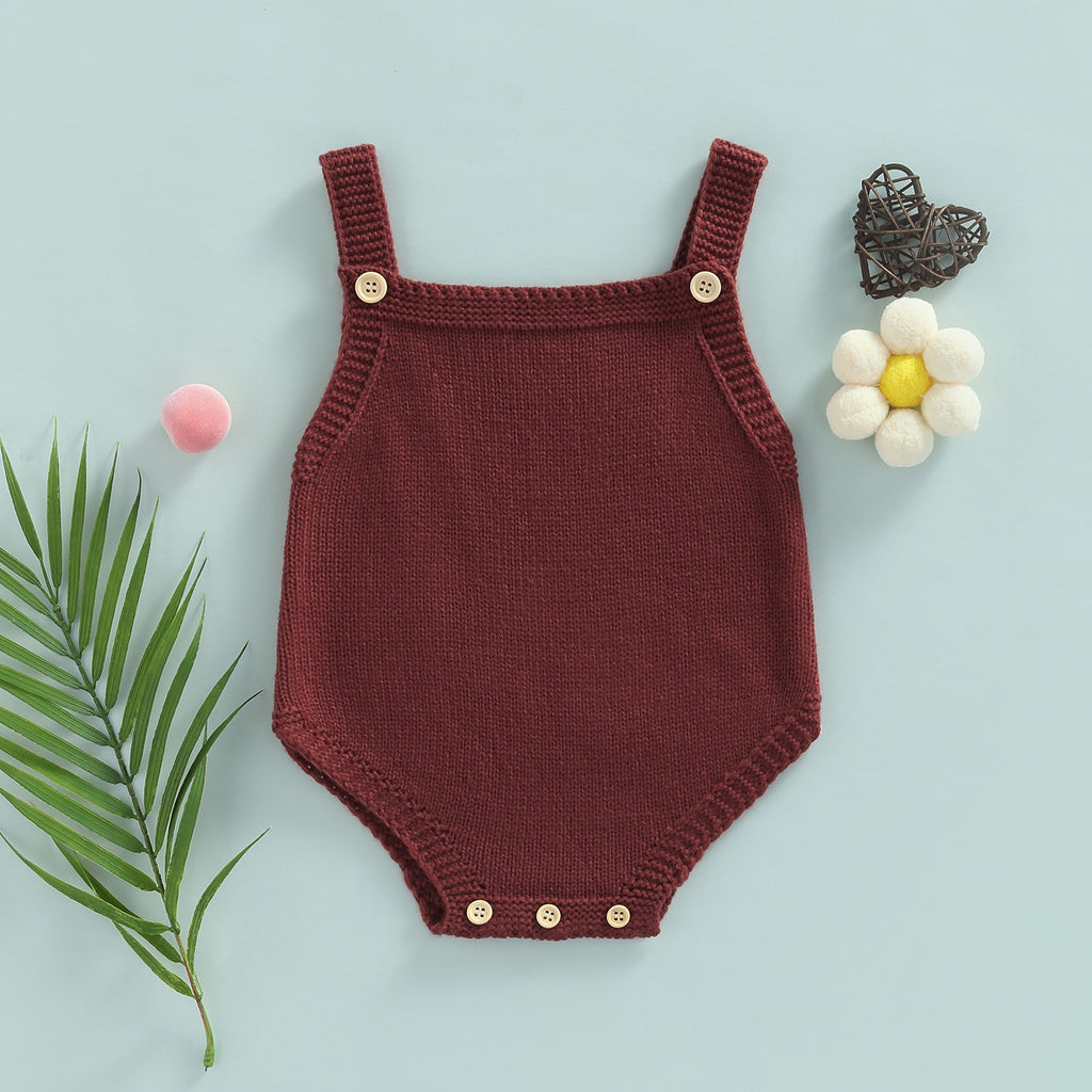 Brick red knitted overall onesie with button straps and button up crotch for reborn baby boys or girls.