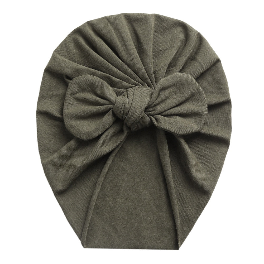 Olive green boho butterfly turban head wrap for newborn babies and reborn dolls.