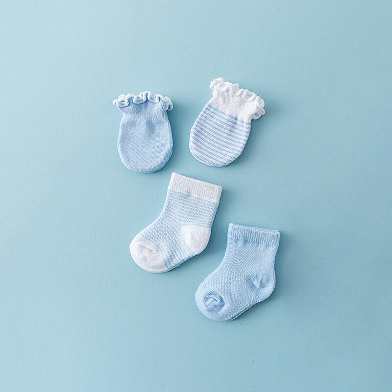 Blue set of anti-scratch mittens in solid and stripes, and two pairs of socks, one solid blue and one blue and white striped with white toe and white ankle. Fits preemies, newborns, reborns, dolls and babies.