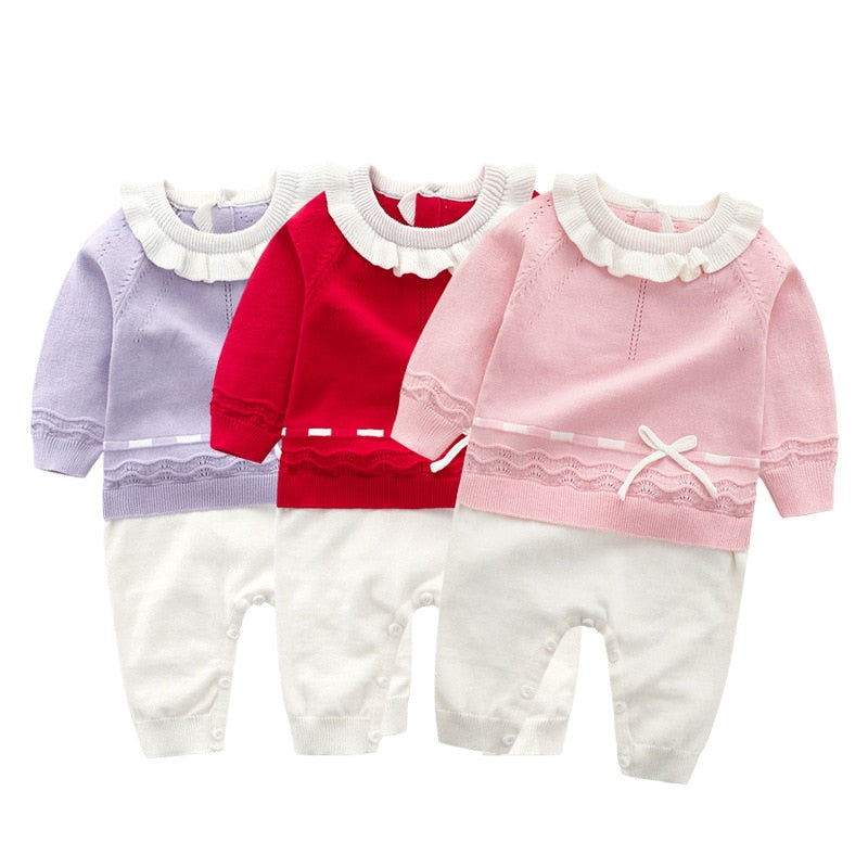 Bella Liv and Maddy Spanish Knitted Baby Rompers in pink, red, and lilac purple.