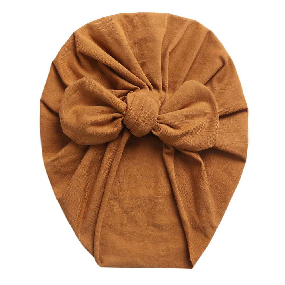 Terra cotta tan/light brown boho butterfly turban head wrap for newborn babies and reborn dolls.