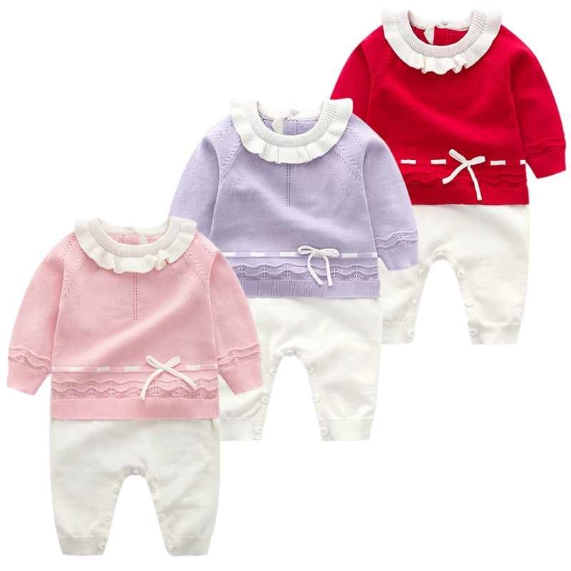 Bella Liv and Maddy Spanish Knitted Baby Rompers in pink, red, and lilac purple.