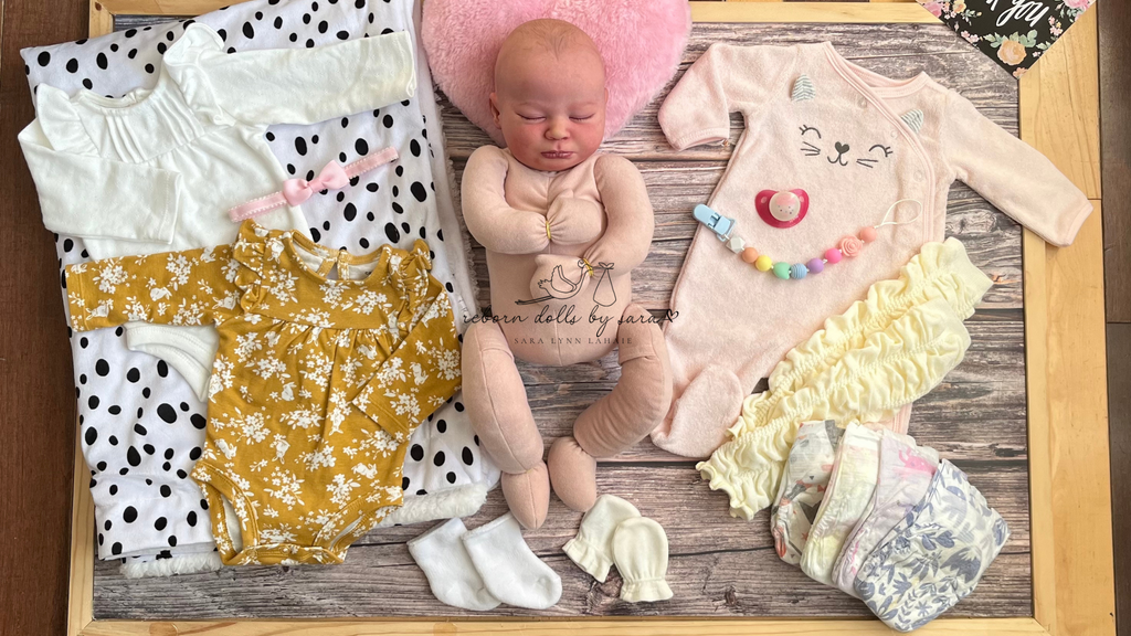 Reborns for sale in Canada realborn newborn Sage sleeping by bountiful baby brought to life by Sara Lahaie from Reborn Dolls by Sara as a cuddle baby girl.