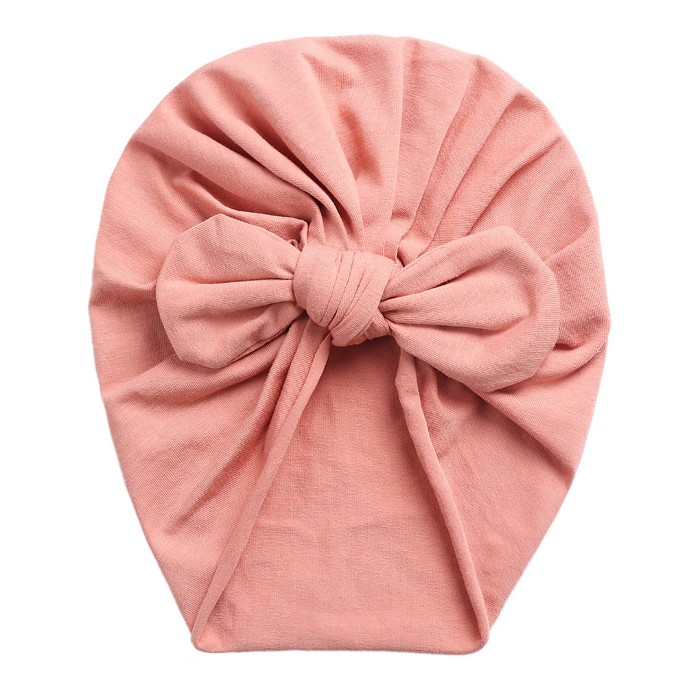 Rose pink boho butterfly turban head wrap for newborn babies and reborn dolls.