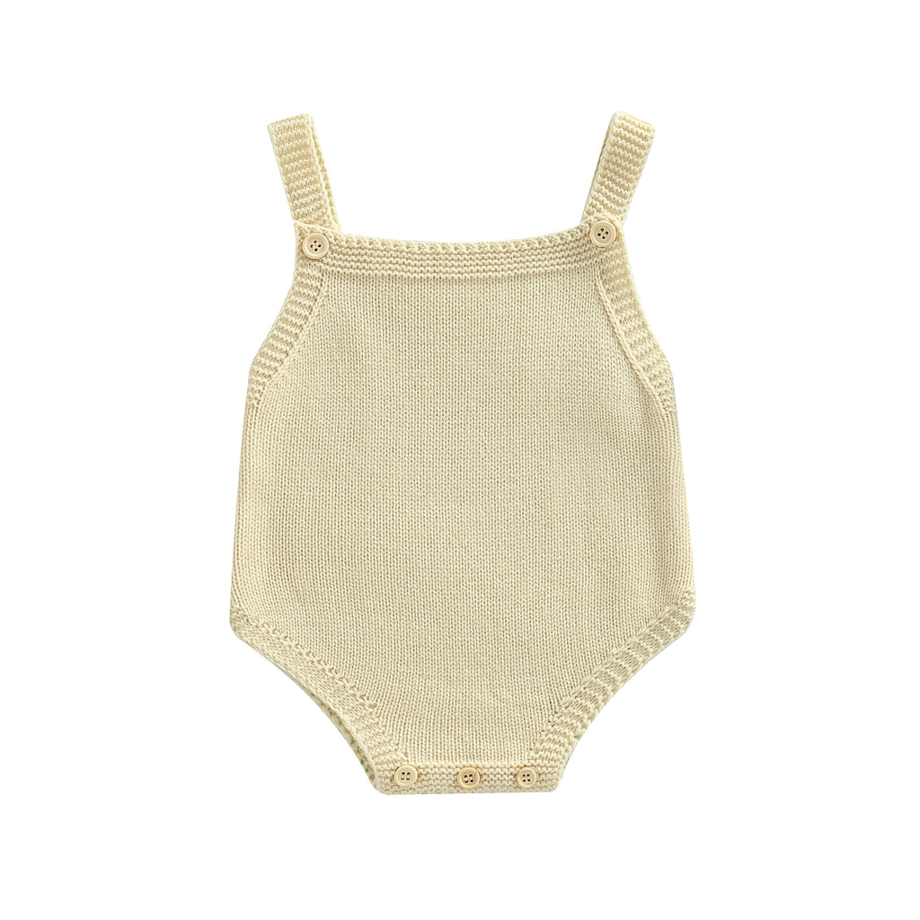 Beige knitted overall onesie with button straps and button up crotch for reborn baby boys or girls.