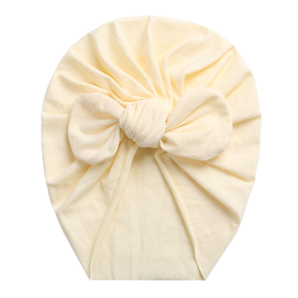 Cream offwhite boho turban knot bow headwrap for baby girls and reborn dolls.