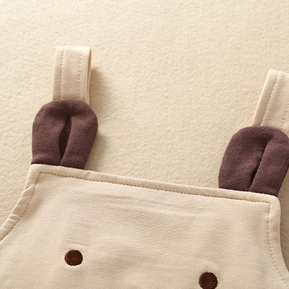 Close-up of brown 3D teddy bear ears on the beige light brown tan colored teddy bear overall bubble romper onesie for reborn baby dolls. Great clothing for twins!