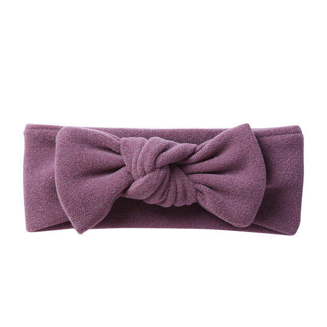 Purple solid color faux cashmere baby headband for girls and reborn dolls.