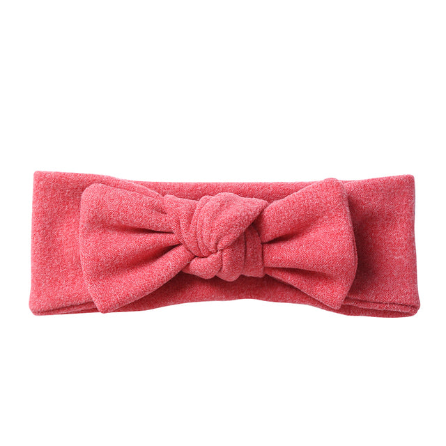 Coral solid color faux cashmere baby headband for girls and reborn dolls.