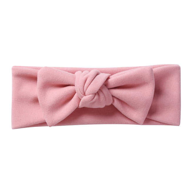 Baby pink solid color faux cashmere baby headband for girls and reborn dolls.