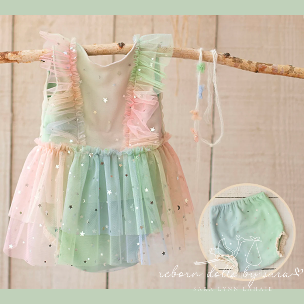 Pastel rainbow newborn photography tulle dress with silver moons and stars for reborn baby girl dolls.