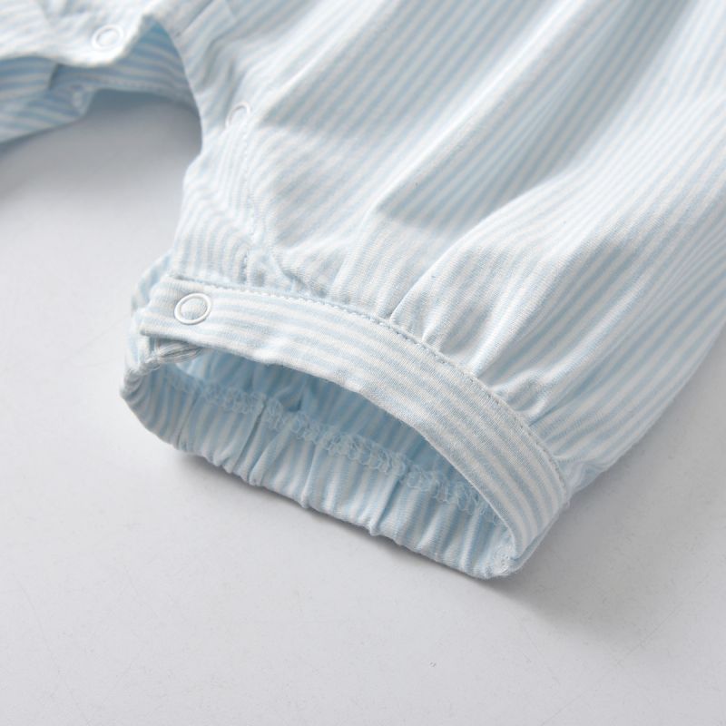 Close-up of the short opening for the legs on the White and baby blue striped Spanish Baby Bubble Romper for Reborn Dolls with a Peter Pan Collar.