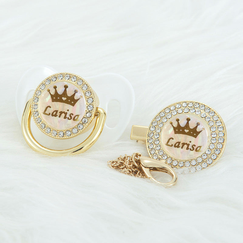 White Prince and Princess Custom Pacifiers with baby's name and gold chain with rhinestone Pacifier Clips for reborn dolls and newborn babies.