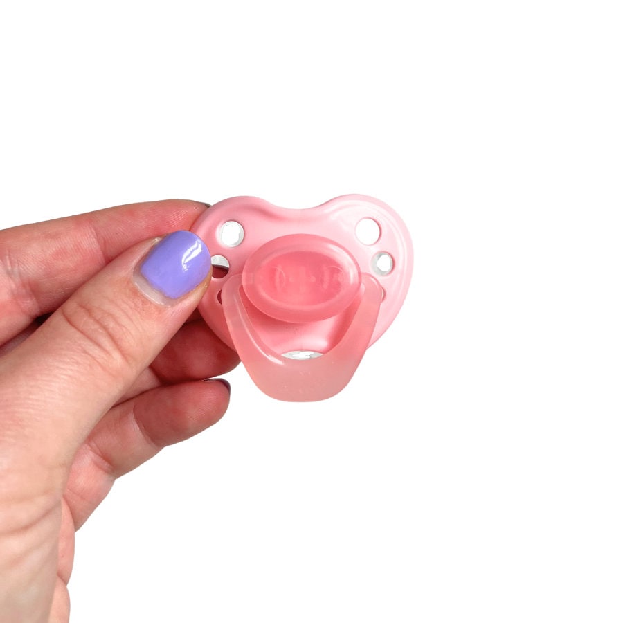 Pink Magnetized Pacifier for Reborn Baby Dolls. Newborn sized pacifier with magnet for reborns. Reborn doll magnetic pacifiers. Pacifier with magnet for reborn dolls. Reborn doll pacifiers by HoneyBug. Reborn dolls.