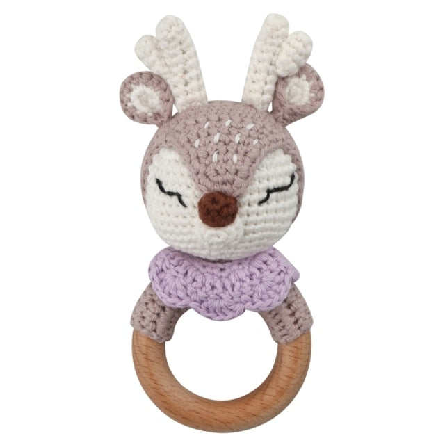 lilac crochet deer rattle with wooden teether for reborns, cuddle babies, and newborns photography prop.