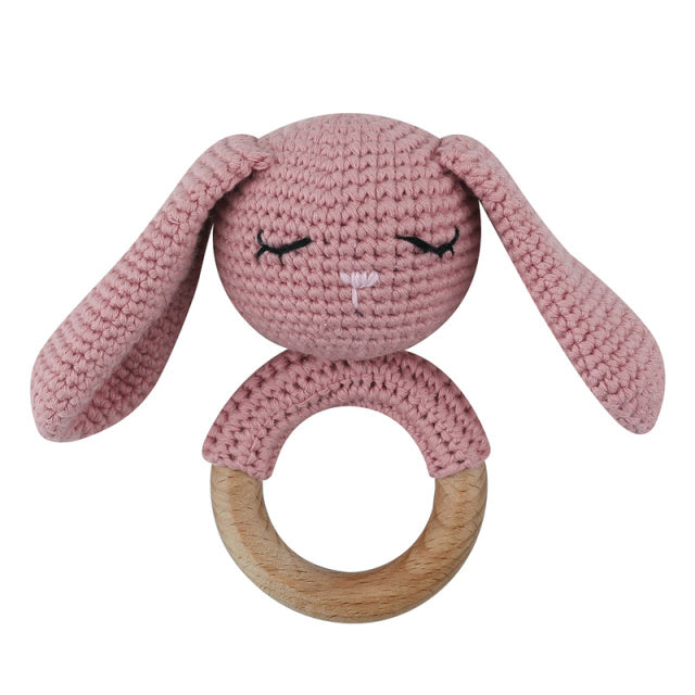 Pink crochet bunny rattle with wooden teething ring for reborn dolls cuddle babies or newborn babies.