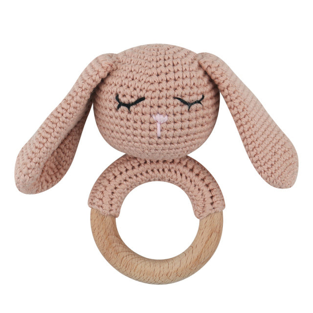 peach crochet bunny rattle with wooden teething ring for reborn dolls cuddle babies or newborn babies.