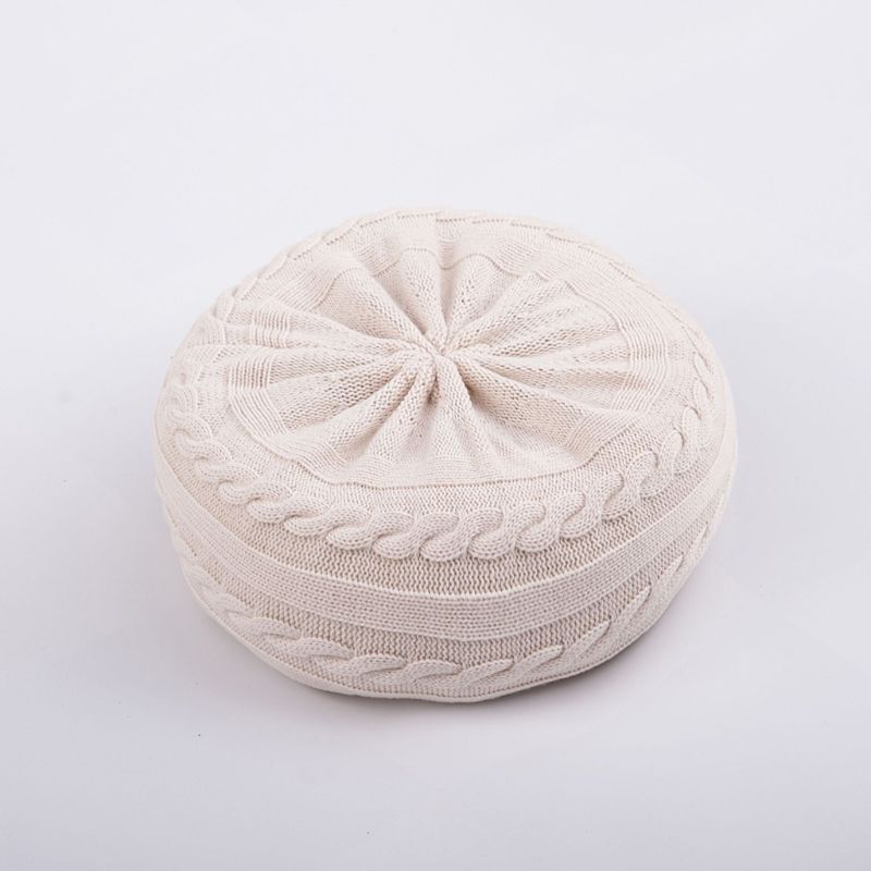 Cream/white posing pillow for reborn dolls or newborn photography with knit cover.